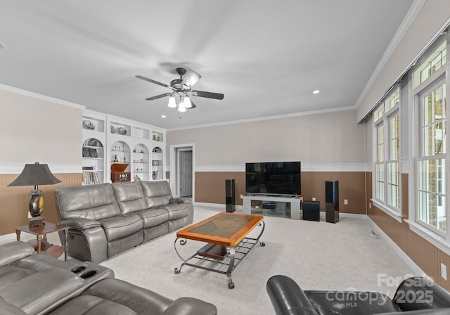 7412 Sahalee Dr, Denver, NC 28037 - living room featuring a wainscoted wall, a ceiling fan, ornamental molding, baseboards, and recessed lighting