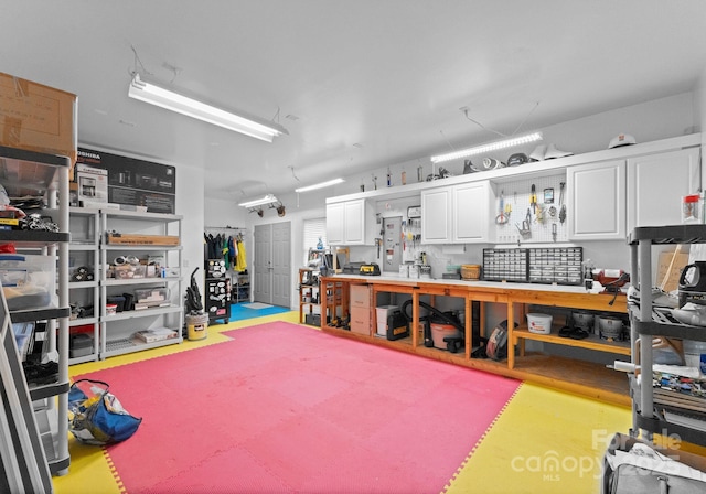 7412 Sahalee Dr, Denver, NC 28037 - garage featuring a workshop area