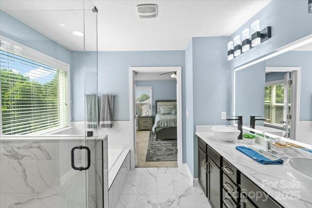 2213 Iron Works Dr, Clover, SC 29710 - full bathroom with plenty of natural light, marble finish floors, double vanity, and connected bathroom