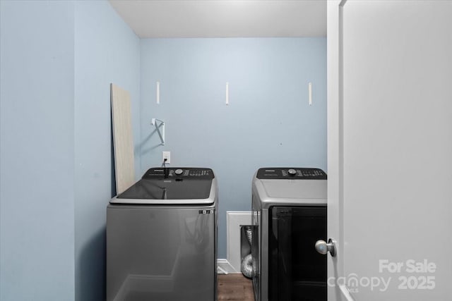 2213 Iron Works Dr, Clover, SC 29710 - laundry room with washing machine and dryer and dark wood-style flooring