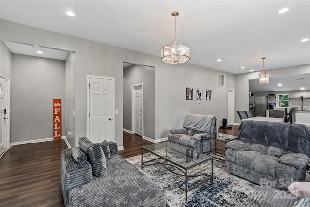 85 Ruritan Park Rd, Stony Point, NC 28678 - living area with wood finished floors, recessed lighting, baseboards, and a chandelier