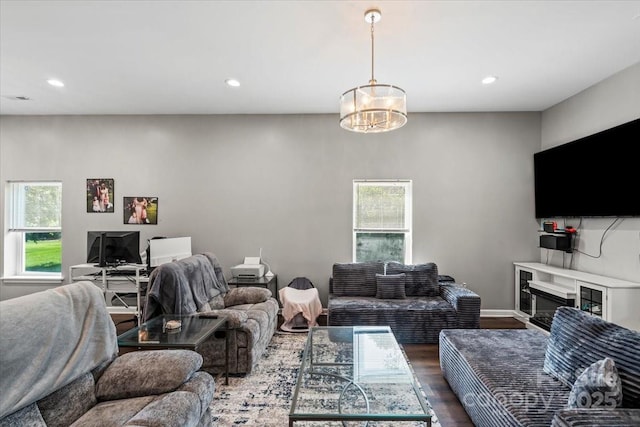 85 Ruritan Park Rd, Stony Point, NC 28678 - living room with plenty of natural light, dark wood-style floors, a chandelier, recessed lighting, and baseboards