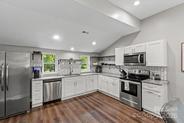 85 Ruritan Park Rd, Stony Point, NC 28678 - kitchen with open shelves, appliances with stainless steel finishes, a sink, backsplash, and white cabinetry
