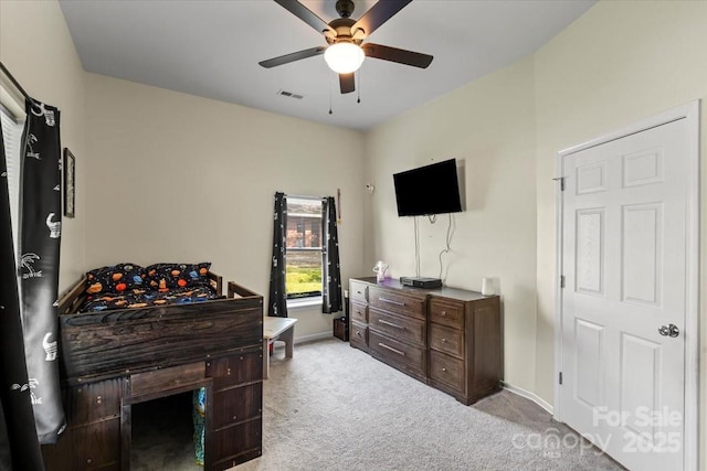 85 Ruritan Park Rd, Stony Point, NC 28678 - bedroom featuring light colored carpet, ceiling fan, and baseboards