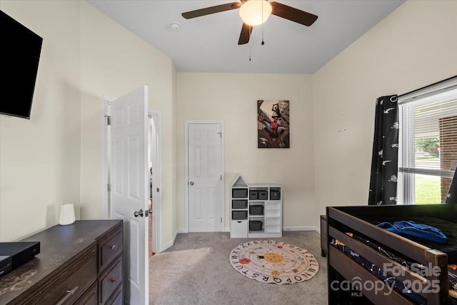 85 Ruritan Park Rd, Stony Point, NC 28678 - carpeted bedroom featuring baseboards and ceiling fan