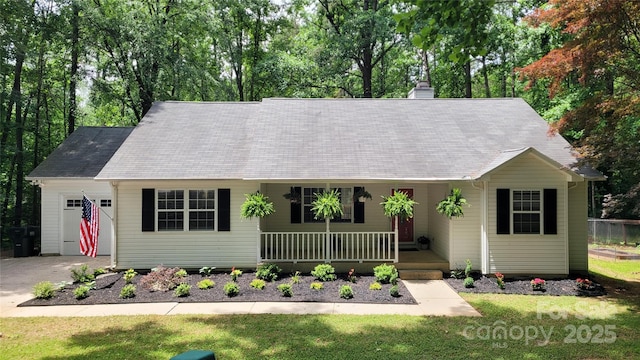 109 Pepper Cir, Mooresville, NC 28117 - view of front of property with covered porch, a chimney, a front lawn, and an attached garage