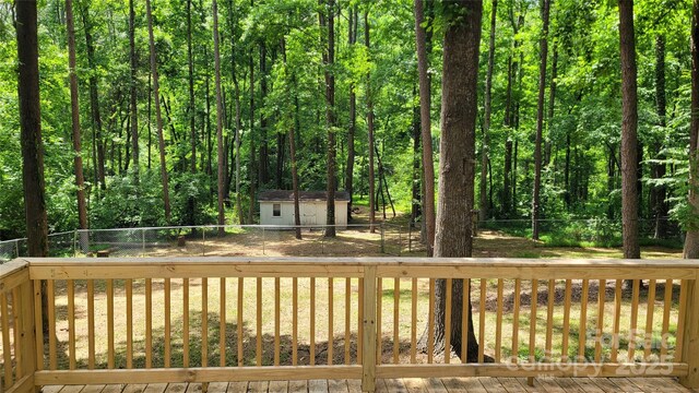109 Pepper Cir, Mooresville, NC 28117 - wooden deck featuring a fenced backyard and a forest view