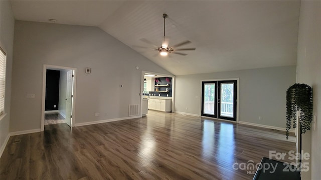 109 Pepper Cir, Mooresville, NC 28117 - unfurnished living room with a ceiling fan, wood finished floors, high vaulted ceiling, and baseboards