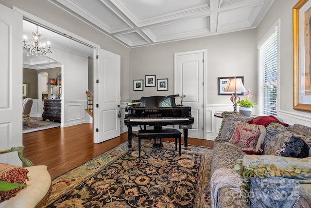 3009 Botetourt Ct, Weddington, NC 28104 - sitting room with wood finished floors, coffered ceiling, crown molding, a decorative wall, and beam ceiling