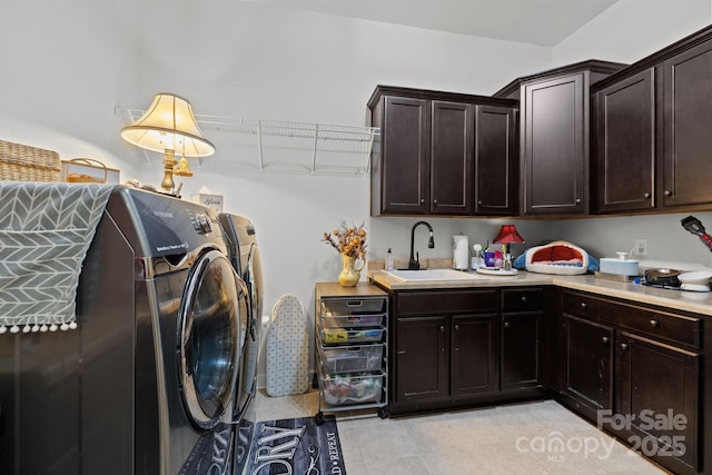 3009 Botetourt Ct, Weddington, NC 28104 - laundry area with cabinet space, washing machine and dryer, and light tile patterned floors