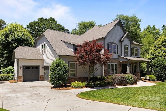 3009 Botetourt Ct, Weddington, NC 28104 - craftsman-style home featuring an attached garage, concrete driveway, stone siding, a front lawn, and roof with shingles