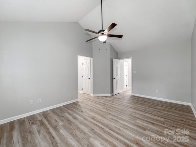 10736 Spruce Mountain Rd, Charlotte, NC 28214 - spare room with ceiling fan, high vaulted ceiling, baseboards, and wood finished floors