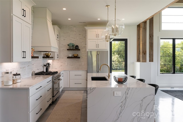 30 Greene Ln, Fletcher, NC 28732 - kitchen with high quality appliances, a sink, custom range hood, open shelves, and healthy amount of natural light