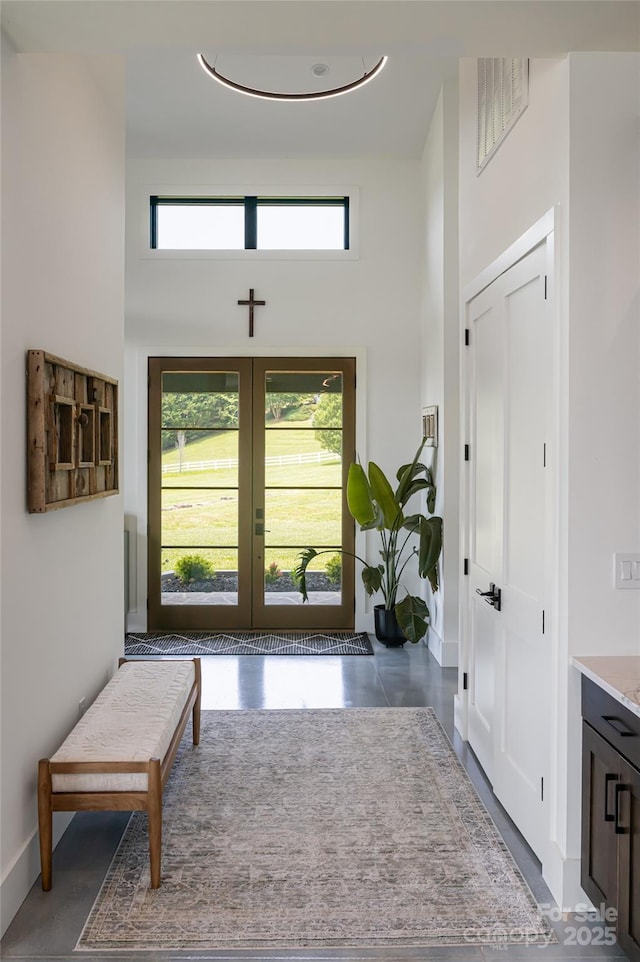 30 Greene Ln, Fletcher, NC 28732 - foyer entrance featuring a towering ceiling, healthy amount of natural light, french doors, and baseboards