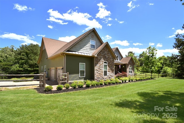 114 Wingard Rd, Concord, NC 28025 - view of front of home featuring stone siding and a standing seam roof