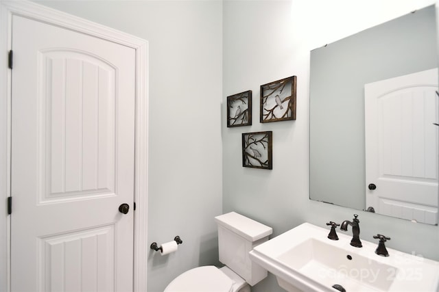114 Wingard Rd, Concord, NC 28025 - bathroom with toilet and a sink
