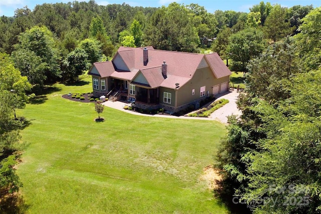 114 Wingard Rd, Concord, NC 28025 - view from above of property with a heavily wooded area
