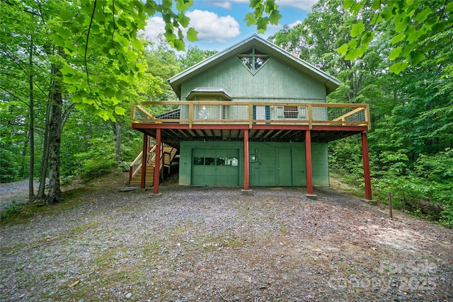 261 Franks Cove Rd, Brevard, NC 28712 - view of front facade with a wooden deck, stairway, driveway, and a garage