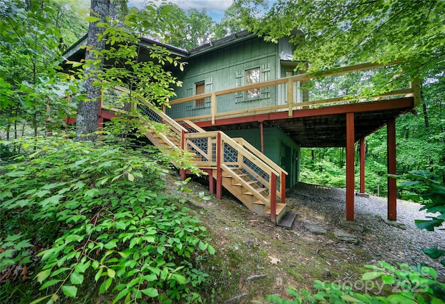 261 Franks Cove Rd, Brevard, NC 28712 - rear view of property with a deck, stairs, and board and batten siding