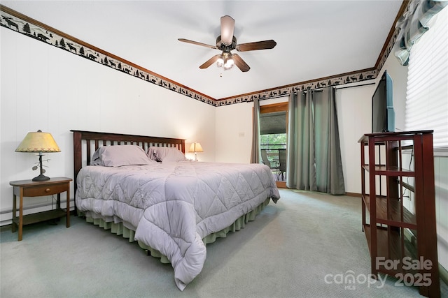 261 Franks Cove Rd, Brevard, NC 28712 - carpeted bedroom with access to exterior, crown molding, ceiling fan, and a baseboard radiator