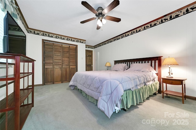 261 Franks Cove Rd, Brevard, NC 28712 - carpeted bedroom featuring a closet, baseboards, and a ceiling fan