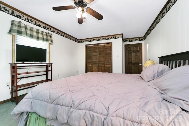 261 Franks Cove Rd, Brevard, NC 28712 - bedroom featuring carpet floors, a closet, crown molding, baseboards, and a ceiling fan