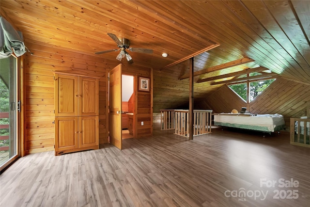 261 Franks Cove Rd, Brevard, NC 28712 - unfurnished bedroom featuring wooden walls, wood ceiling, light wood-style flooring, and vaulted ceiling