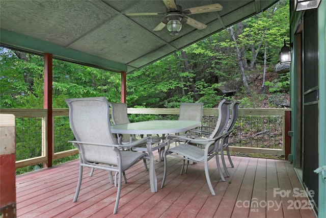 261 Franks Cove Rd, Brevard, NC 28712 - wooden deck featuring outdoor dining area and a ceiling fan