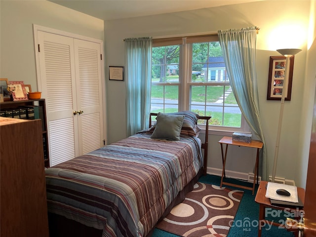 5806 Whitingham Dr, Charlotte, NC 28215 - bedroom featuring a closet and baseboards