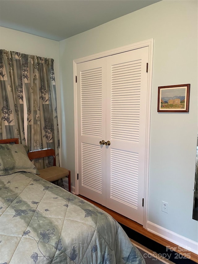 5806 Whitingham Dr, Charlotte, NC 28215 - bedroom featuring a closet and baseboards