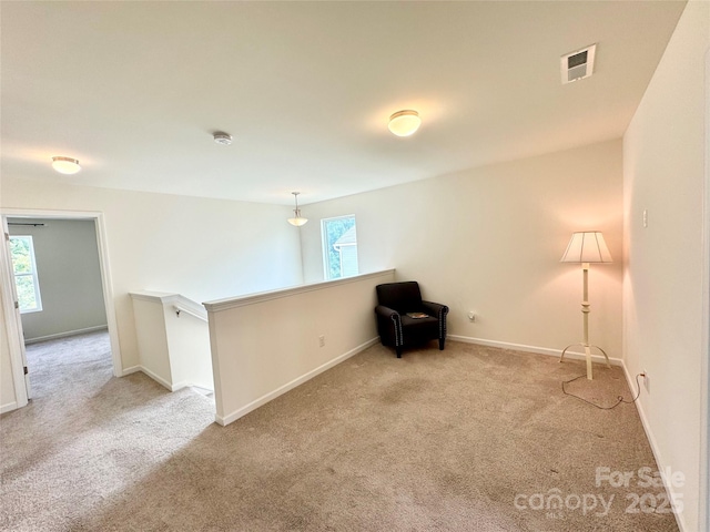 750 Fraternity Row, Kannapolis, NC 28081 - unfurnished room featuring carpet floors, baseboards, and an upstairs landing