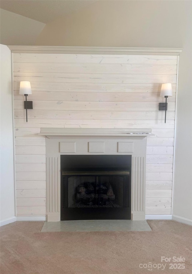 1743 Silver Stream Dr, Rock Hill, SC 29730 - detailed view of a fireplace with flush hearth, carpet flooring, wooden walls, and baseboards