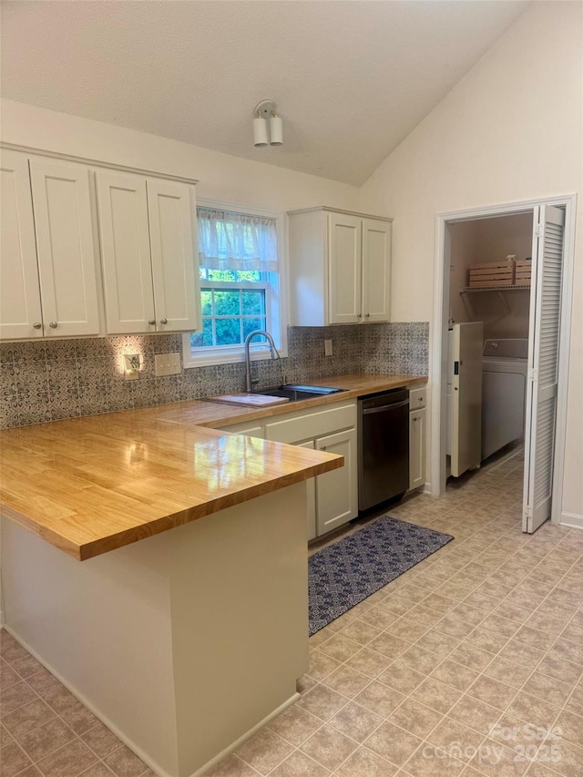 1743 Silver Stream Dr, Rock Hill, SC 29730 - kitchen with dishwasher, butcher block countertops, washer / dryer, decorative backsplash, and lofted ceiling