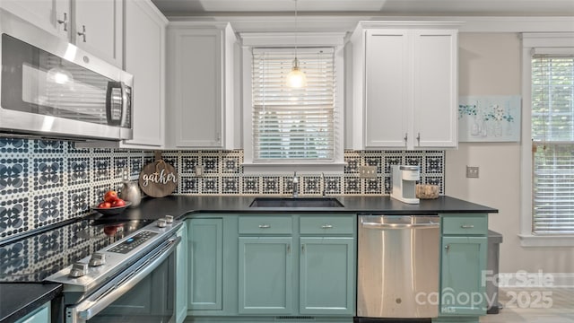 6129 Caseys Side Way, Fort Mill, SC 29708 - kitchen featuring appliances with stainless steel finishes, a sink, dark countertops, and tasteful backsplash
