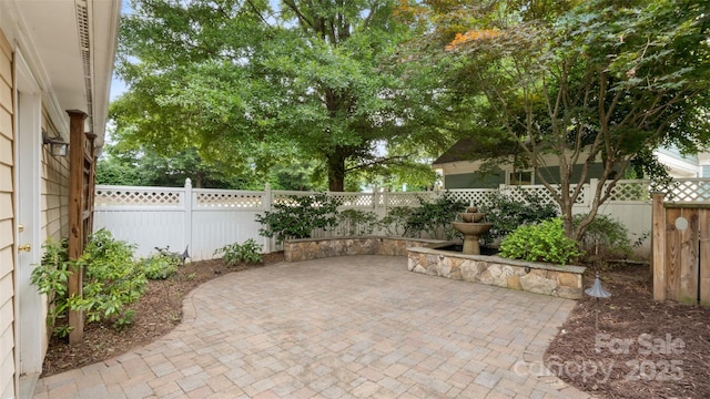 6129 Caseys Side Way, Fort Mill, SC 29708 - fenced backyard featuring a patio area