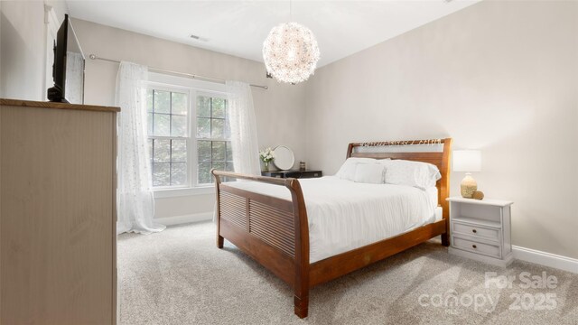 6129 Caseys Side Way, Fort Mill, SC 29708 - carpeted bedroom featuring baseboards and a chandelier