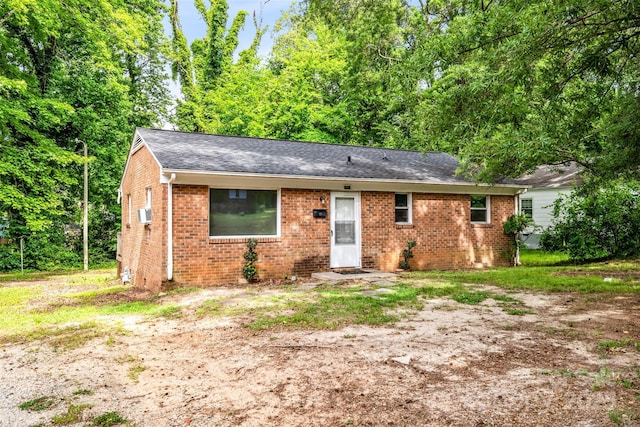 1310 Caldwell St, Greensboro, NC 27406 - view of front of home with brick siding and roof with shingles