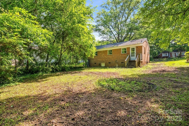 1310 Caldwell St, Greensboro, NC 27406 - view of yard featuring entry steps