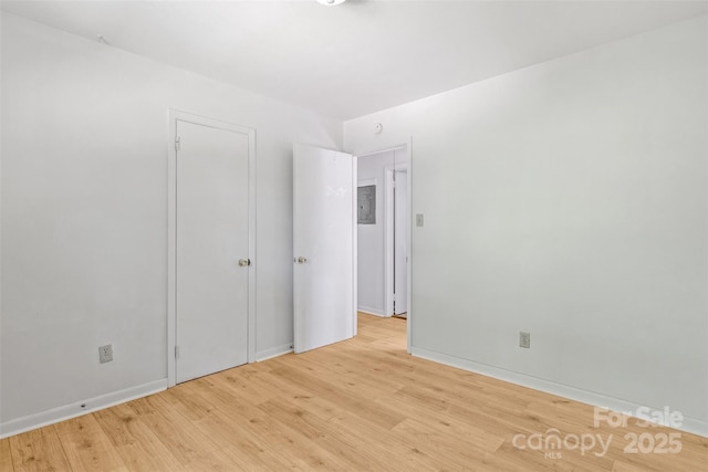 1310 Caldwell St, Greensboro, NC 27406 - spare room with light wood-style floors and baseboards
