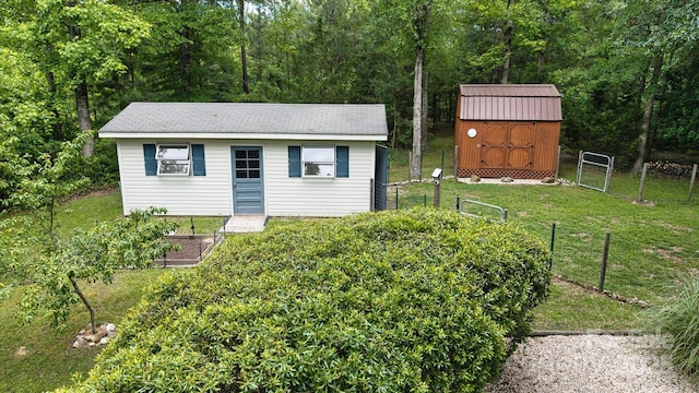 2618 Pineview Dr, Lancaster, SC 29720 - view of outbuilding with a vegetable garden and a forest view