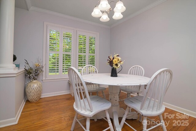 2618 Pineview Dr, Lancaster, SC 29720 - dining room with baseboards, a chandelier, light wood-type flooring, and ornamental molding