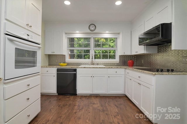 2618 Pineview Dr, Lancaster, SC 29720 - kitchen featuring black appliances, a sink, white cabinetry, tasteful backsplash, and dark wood-style floors