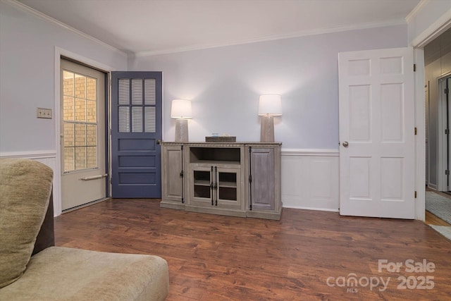 2618 Pineview Dr, Lancaster, SC 29720 - living area with ornamental molding, dark wood finished floors, wainscoting, and a decorative wall