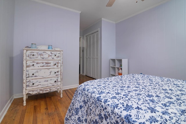 2618 Pineview Dr, Lancaster, SC 29720 - bedroom featuring hardwood / wood-style flooring, a closet, ornamental molding, a ceiling fan, and baseboards