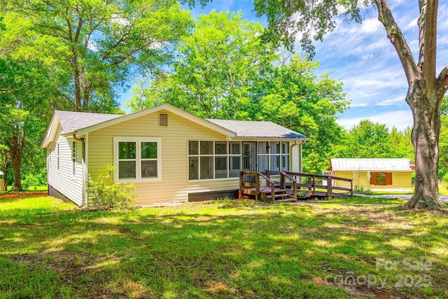 1224 Martin Rd, Hickory Grove, SC 29717 - rear view of property with a sunroom, a yard, a shingled roof, and a deck