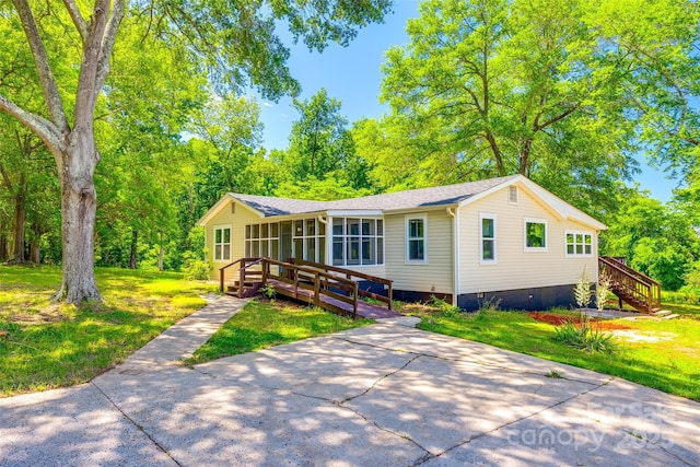 1224 Martin Rd, Hickory Grove, SC 29717 - view of front of house featuring a sunroom, stairs, a front yard, and crawl space