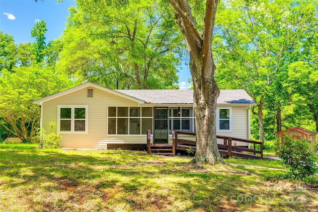 1224 Martin Rd, Hickory Grove, SC 29717 - back of property featuring a sunroom, a lawn, and roof with shingles