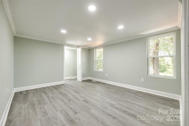 1224 Martin Rd, Hickory Grove, SC 29717 - empty room featuring crown molding, recessed lighting, baseboards, and wood finished floors