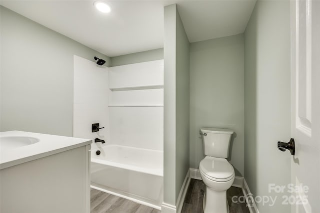 1224 Martin Rd, Hickory Grove, SC 29717 - full bathroom with wood finished floors, toilet, tub / shower combination, vanity, and baseboards