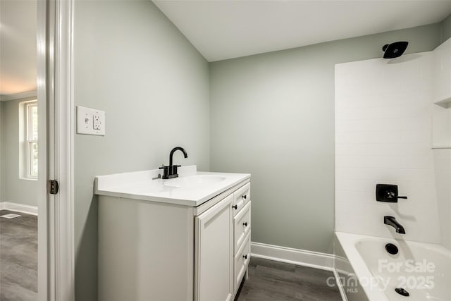 1224 Martin Rd, Hickory Grove, SC 29717 - bathroom featuring baseboards, vanity, bathing tub / shower combination, and wood finished floors